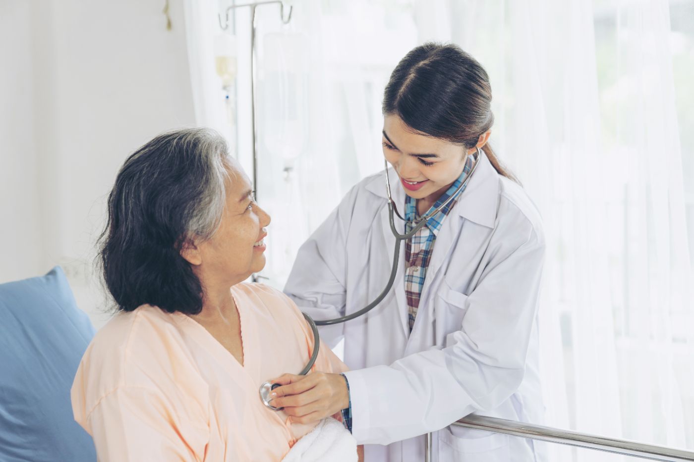 Professional caregiver providing cardiac care at home in Bangalore
